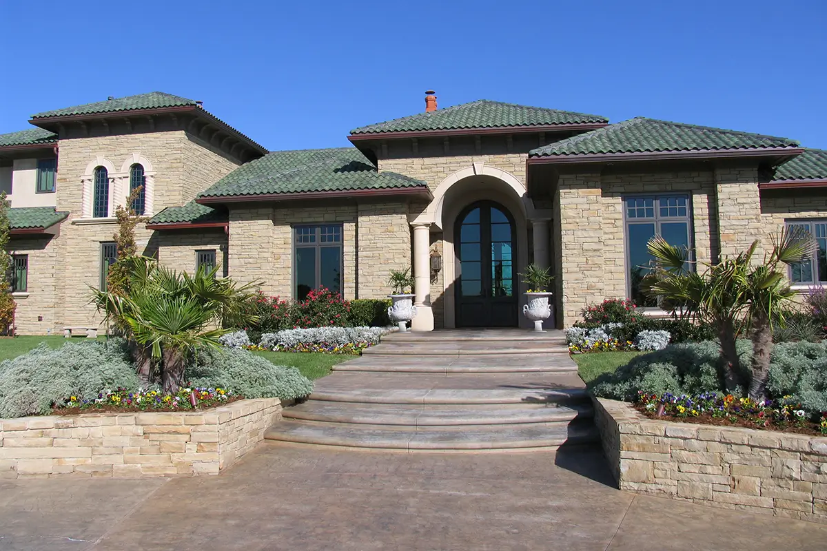 A home exterior built with sandstone