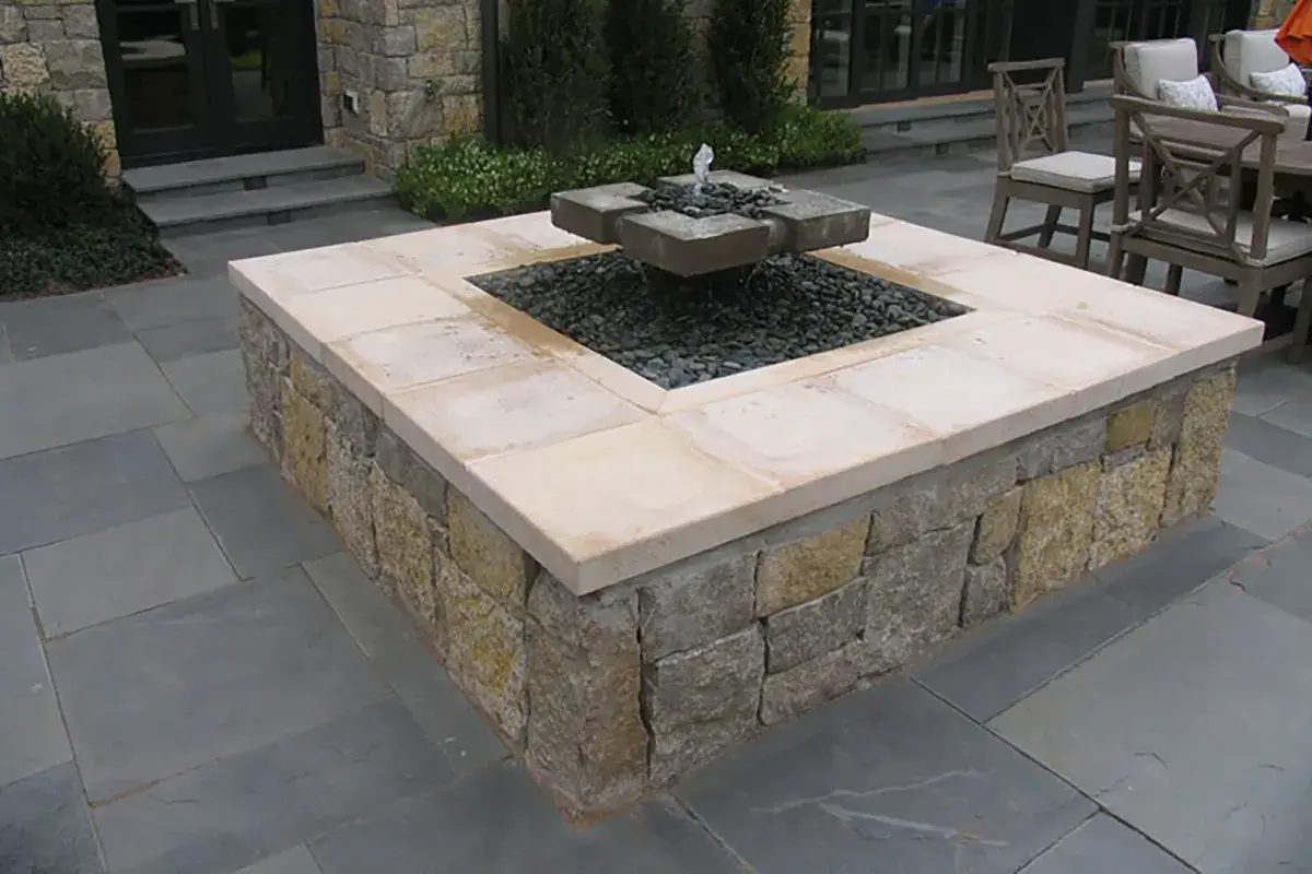 Bluestone flooring around a fountain