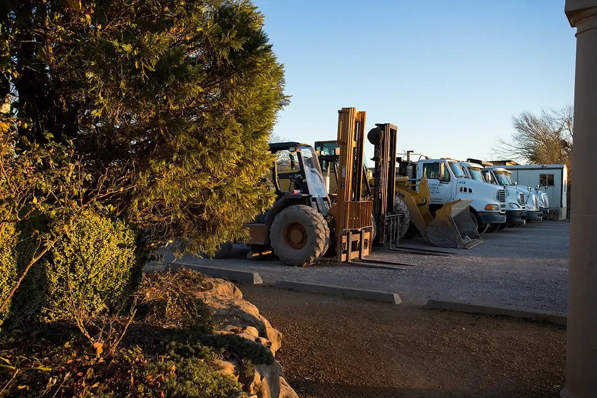 A forklift at a stone yard